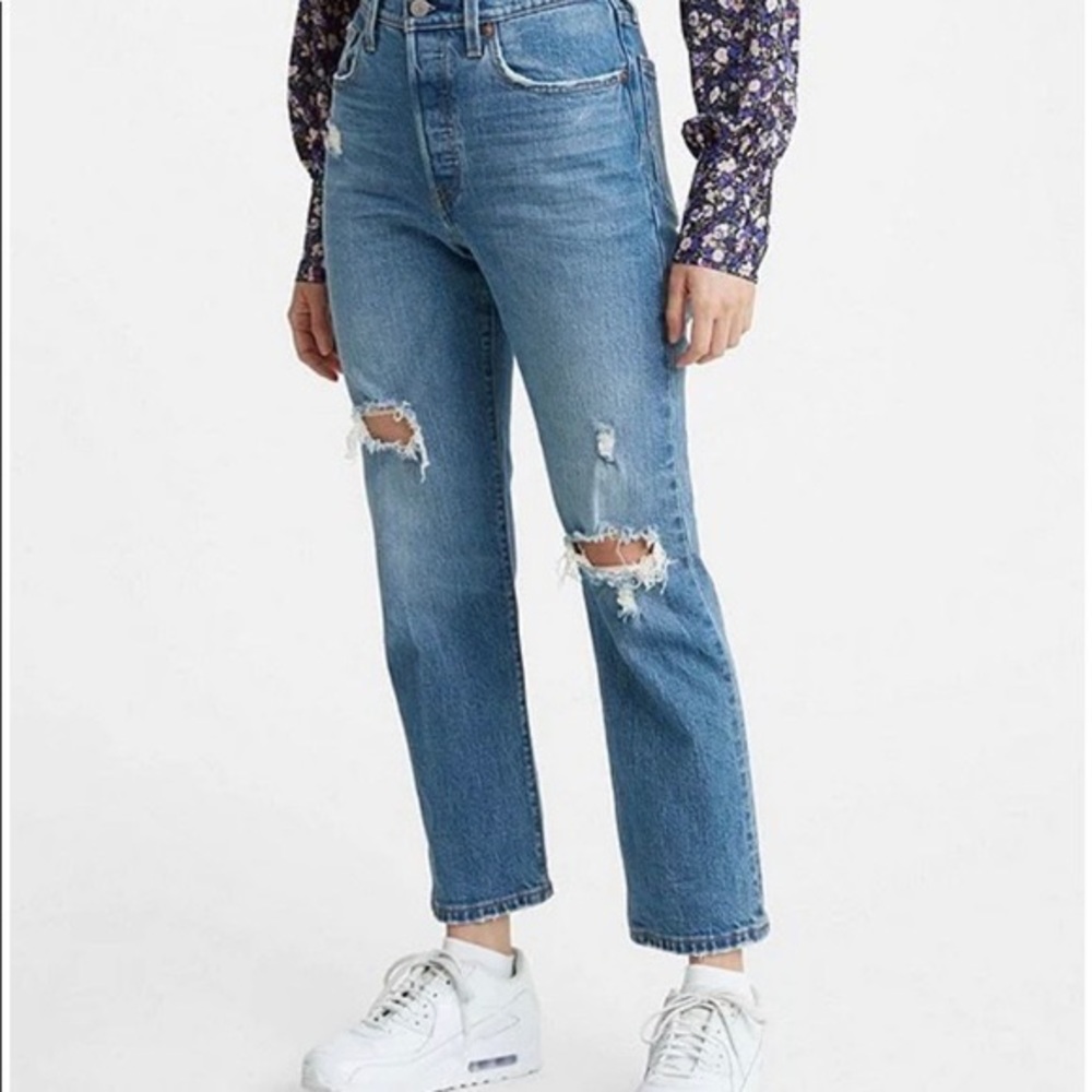 Levi’s 501 Distressed Denim.
